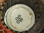 The 3 images above show how a drop of ferrofluid forms spikes and ultimately a spiral when a vertical magnetic field is applied, followed by a rotating field. The second set of images, below, show what happened when the experiment was run in reverse. The changes resulted in designs resembling Native American art.