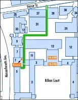 Christopher Reeve and his companions will enter the campus from Vassar Street between Buildings 37 and 39. They will park their automobile next to Building 5 and enter Building 7 at ground level. The group will take the elevator to the third floor to go to the Emma Rogers Room (10-340) for a brief respite. Then they will return to the Building 7 elevator to descend one floor to Room 10-250 where R...