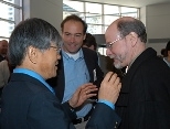 Chatting during a break at the Picower-RIKEN Neuroscience Symposium are (left to right) Susumu Tonegawa, a Nobel laureate and director of the Center for Learning and Memory; Professor Mark Bear, who just joined the Picower Center and the brain and cognitive sciences faculty; and 2002 Nobelist H. Robert Horvitz.