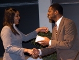 Karl W. Reid, executive director, office of special programs, School of Engineering, congratulates senior Danielle R. Lawrence on winning the Ronald E. McNair Scholarship award.