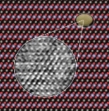 A computer simulation shows how columns of atoms in lithium cobalt oxide, seen end-on, ought to appear. The inset is the actual image taken with a transmission electron microscope. It shows the arrangement of lithium ions among cobalt and oxygen atoms in the compound lithium cobalt oxide. The oxygen atoms are bright and sharp-edged, the cobalt atoms are fuzzy, and the lithium atoms are small, weak...