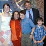 Biology professor              and director of The Broad Institute Eric Lander stands behind his              family at the June 19 press conference announcing the new institute.              From left: daughter Jessica, 15; wife Lori; and sons Daniel, 12, and              David, 8.
