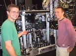 Tom Pasquini (left) and Aaron Leanhardt in front of the machine where they and collaborators cooled a sodium gas to 500 picokelvin.