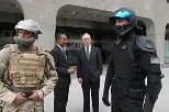 Vest with soldiers and Claude Bolton Jr., secretary of the Army for acquisition, logistics and technology (at Vest's right) at the dedication of the Institute for Soldier Nanotechnologies in May.