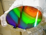MIT's Nanoruler was used to create parallel lines and spaces only 400 billionths of a meter apart (the diameter of a human hair is about 250 times larger) across this silicon wafer. The wafer is 12 inches in diameter.