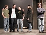 A company of actors, including (left to right) sophomore Kenny Roraback, Aaron Moronez (S.B. 2003), senior Amado Dehoyos, junior Masha Kamenetska and senior Max Goldman, portray a company of actors in Alan Brody's play "Company of Angels."
