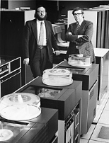 Joel Moses and Michael Dertouzos (then associate director and director, respectively, of the Lab for Computer Science) in the laboratory during the mid-1970s.