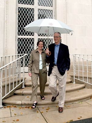 'At least there'll be three of us,' MIT President Charles Vest quipped to a photographer as he and his wife Rebecca left Gray House during a steady drizzle to attend the Sept. 18, 2004 community celebration in their honor at the Stata Center. In fact... <a onclick="MM_openBrWindow('1-vestparty-enlarged.html','','width=509, height=583')"><span onmouseover="this.className='cursorChange';">Open imag...