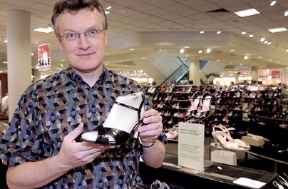 Alumnus Brian Hughes, chairman of Insolia shoe company, explains the engineering used in his product to make high heel shoes more comfortable.