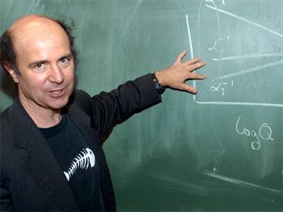 MIT physics professor Frank Wilczek explains his Nobel Prize-winning theory at a press conference Tuesday, Oct. 5.