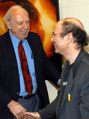 1990 physics Nobelist Jerome Friedman congratulates colleague Frank Wilczek on winning this year's prize in physics.