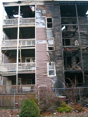 Wes Austin's apartment building following the fire that destroyed many of his belongings.