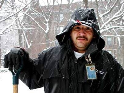 MIT landscaper Isias Soto traded his rake for a shovel during a recent snowstorm on campus.