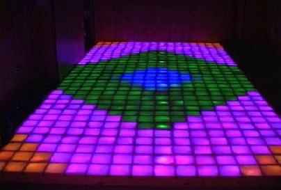 More than 500 lighted tiles give the floor of MIT's East Campus lounge its disco groove. Controlled by computer, the student-built dance floor is capable of an eye-popping 4,100 color combinations.