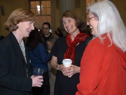 President Susan Hockfield, left, shares a light moment with Mary Elliff, center, of the Program in Atmospheres, Oceans and Climate, and Nancy Stauffer of the Laboratory for Energy and the Environment at the Working Group on Support Staff Issues inauguration reception on May 3.