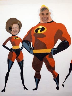 MIT President Susan Hockfield and her husband, Thomas Byrne, poke some 'incredible' fun at themselves, posing in cut-out images of the popular superheroes. The exhibit was part of the Uncommon Block Party held at MIT May 7 to mark Hockfield's inauguration as president of MIT.
