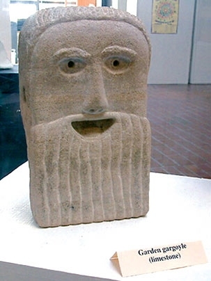 'Happy God/Garden Gargoyle' was carved by Paul Angiolillo from a limestone block salvaged at a building demolition at Princeton University. The sculpture is part of a collection on display at the Rotch Library of Planning and Architecture through the end of December.