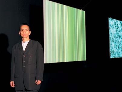 MIT Associate Professor John Maeda stands alongside stills from his 'Nature' series at the Fondation Cartier Pour l'Art Contemporain in Paris. <a onclick="MM_openBrWindow('maeda-portrait-enlarged.html','','width=509, height=583')">
<span onmouseover="this.className='cursorChange';">Open image gallery</span>
</a>
<noscript> <a href="maeda-portrait-enlarged.html">
<em>(no JavaScript)</em>
</a>...