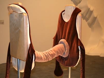 MIT graduate student Marisa Jahn designed a pair of vests joined by a bellows-like tube, which creates a sound. The garment will be featured at 'Seamless: Computational Couture,' a Feb. 1 fashion event curated by MIT Media Lab students. <a onclick="MM_openBrWindow('seam-jahn-2-enlarged.html','','width=509, height=583')">
<span onmouseover="this.className='cursorChange';">Open image gallery</span>...