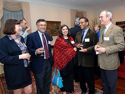 Newly tenured faculty members were feted at Gray House on Tuesday, May 16. From left are Elly Nedivi of brain and cognitive sciences (BCS), who received tenure; Mriganka Sur, head of BCS; Pamela Lipson (S.M. 1993, Ph.D. 1996); her husband, Pawan Sinha, who received tenure; and L. Rafael Reif, provost.
