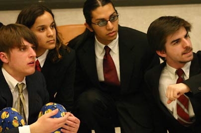 A scene from MIT Dramashop's "Electronic City," which will tour England this summer. From left: sophomores Jonas Kubilius, Larissa Estrada and Estevan Martinez, and junior Yuri Podpaly.
