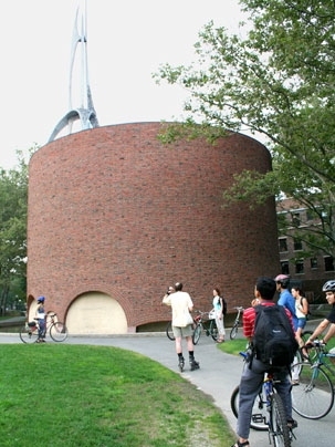 Graduate students on the 'Art on Wheels' tour stop outside the MIT Chapel on July 11. The chapel's spire and bell tower were designed by sculptor Theodore Roszak.