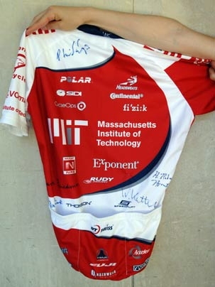 Four Nobel laureates -- Jerome Friedman, Robert Horvitz, Wolfgang Ketterle and Phillip Sharp -- and Turing Award winner Ronald Rivest signed two cycling jerseys to help raise money for the MIT cycling team.