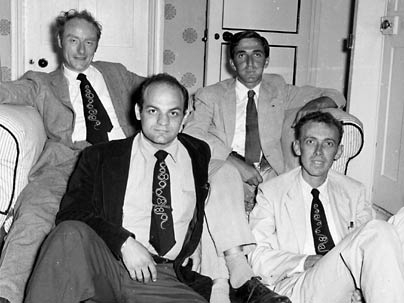Alexander Rich, front row, left, was a member of the RNA Tie Club, which had 20 members, one representing each amino acid. Rich is joined in this 1955 photo by biophysicist James Watson (front row, right), chemist Leslie Orgel (back row, right) and molecular biologist Francis Crick. Watson and Crick together discovered the double helix structure of DNA in 1953.