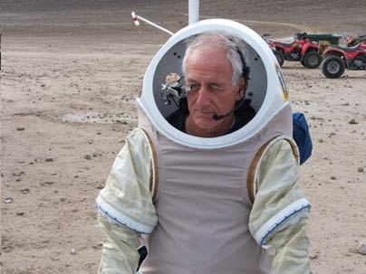 MIT Professor Jeffrey Hoffman tests a spacesuit on Mars-like terrain in the Arctic in 2005.