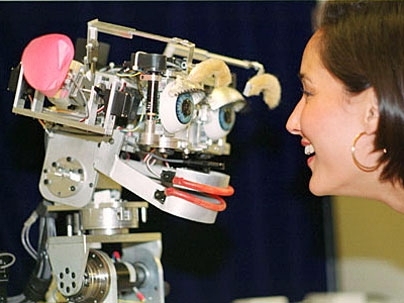 Cynthia Breazeal, MIT Media Lab, faces Kismet, a robot that mimics emotion. This photo is from 2000. <a onclick="MM_openBrWindow('coveney-kismet-enlarged.html','','width=509, height=583')">
<span onmouseover="this.className='cursorChange';">Open image gallery</span>
</a>
<noscript> <a href="coveney-kismet-enlarged.html">
<em>(no JavaScript)</em>
</a>
</noscript>