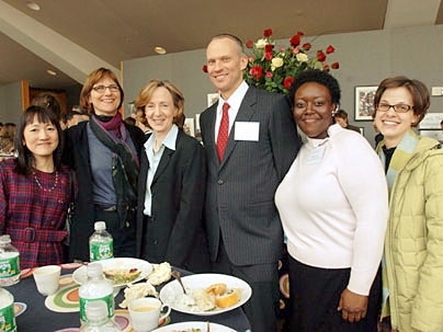 Tamako Harrington, Judy Daniels, President Susan Hockfield, Jim Harrington, Elizabeth Pierre and Jamie Fabianski celebrated after Jim Harrington won an Excellence Award.