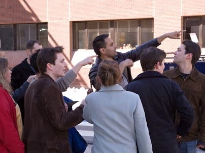 Ashok Roy MBA '07, rear center, helps point the way for another "Hunt" team.