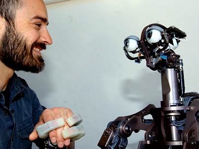 An assistive robot has to be able to sense when a human is touching it. Domo has springs in its arms, hands and neck that can sense force and respond to it.