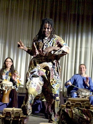Lamine TourÃ© (center), artist-in-residence, with Rambax members.