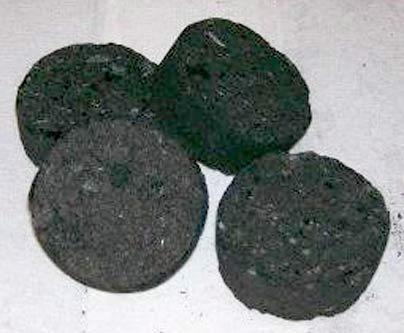 Charcoal briquettes made from plant waste material. An MIT student-created company, Bagazo, plans to produce these briquettes as cooking fuel in Haiti.