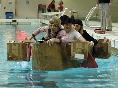 The crew of the Black Pearl sets off in the Head of the Zesiger cardboard regatta.