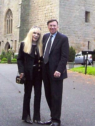 Stuart Madnick, Baron of Langley, and his wife, Yvonne, stand before their 14th-century castle in Northumberland, England.
