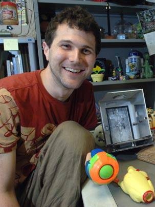 Mechanical engineering graduate student Barry Kudrowitz, who teaches a toy product design course at MIT, began his design life building an Epcot theme park out of LEGOs. Here he is shown with some of his more
recent creations.