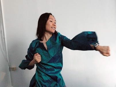 With microphones hidden in her garment, graduate student Angela Chang demonstrates how her movement in this glorious silk tunic dictates how she sounds.