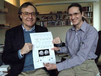 John Gabrieli, the Grover Herman Professor of Health Sciences and Technology and Brain and Cognitive Sciences, left, and McGovern Institute research scientist Trey Hedden display the results from their recent psychological study.