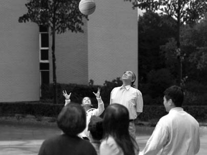 This image, from Belgian artist David Claerbout's "Sections of a Happy Moment," displays a family playing catch.