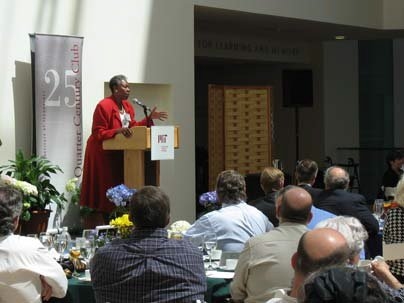 Yvonne L. Gittens, QCC president, congratulates new members of the club.