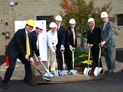 The groundbreaking ceremony for the new computer center at the MIT-Bates Linear Accelerator Center included, from left, Bolek Wyslouch, professor in physics and the Laboratory for Nuclear Science (LNS);
Robert Redwine, professor of physics and director of MIT-Bates; Karen Dow of LNS and associate director of MIT-Bates; Ed Bertschinger, head of the MIT Department of Physics; Brad Black, principal ...