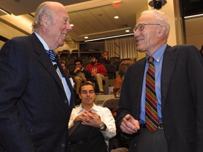 George Shultz greets Robert Solow, MIT professor emeritus in economics and a Nobel laureate, at his MIT lecture on the need to achieve energy independence. Shultz PhD '49, taught at the Institute in the late 40s and 50s.