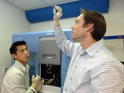 Eric Wang, graduate student in the Harvard-MIT Division of Health Sciences and Technology, and Christopher Burge, Whitehead Career Development Associate Professor of Biology and Biological Engineering at MIT used a gene-sequencing machine in their work finding that nearly all human genes undergo differential splicing.