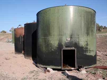 Tanks on retiree property after an explosion. Silt, Colorado. <a onclick="MM_openBrWindow('gastanks-1-enlarged.html','','width=509, height=583')">
<span onmouseover="this.className='cursorChange';">
<strong>Open image gallery</strong>
</span>
</a>
<noscript> <a href="gastanks-1-enlarged.html">
<em>(no JavaScript)</em>
</a>
</noscript>