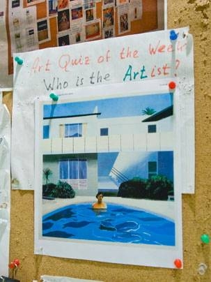 This week's entry in Professor Walter Lewin's weekly art contest. The pieces are posted on a board near his office, and the answers from previous weeks fill the rest of the board.