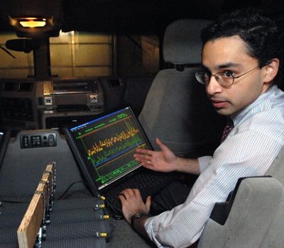 Shakeel Avadhany (Materials Science '09) monitors pressure, position, and generated power sensor data on the custom data acquisition system.