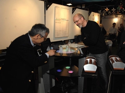 Muriel R. Cooper Professor of Media Arts and SciencesÂ Hiroshi Ishii shows video artist Bill Viola around some of the projects in the Tangible Bits Lab.