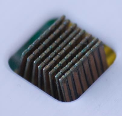 A close-up of the stimulator used in a study to show that how humans feel the world can actually change how they see it --Â and vice versa. The device consists of a centimeter-square array composed of 60 pins to deliver precisely controlled vibrations to the fingertips.
